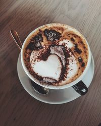 High angle view of cappuccino on table