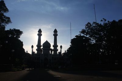 Silhouette of building against sky