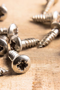 Close-up of chain on table