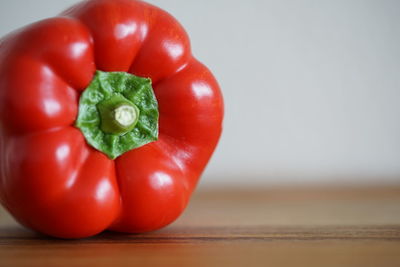 Close-up of red bell peppers on table