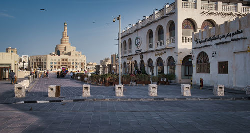 Souk waqif in doha qatar daylight exterior view showing al-fanar qatar islamic cultural center w