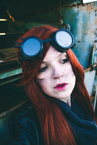 Portrait of young woman looking away