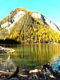 Scenic view of lake and mountains against clear sky