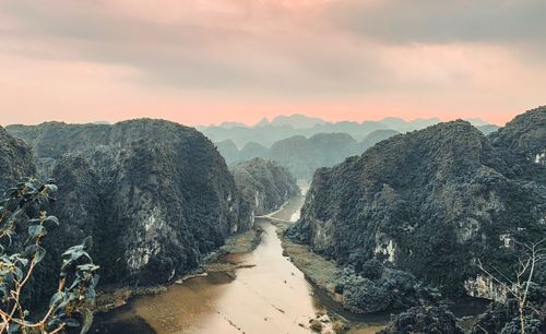 Scenic view of mountains against sky during sunset