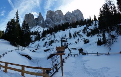 Scenic view of snow covered mountains