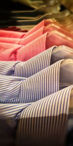 Close-up of shirts on coathangers