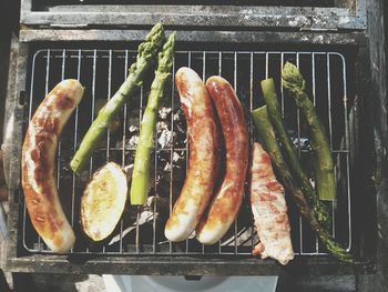 Close-up of meat on grill