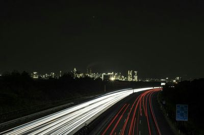 Light trails on road at night