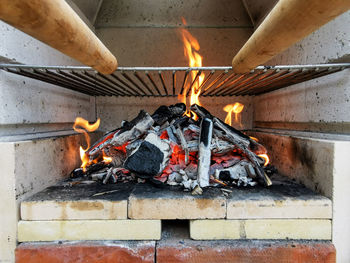 Close-up of firewood on barbecue grill