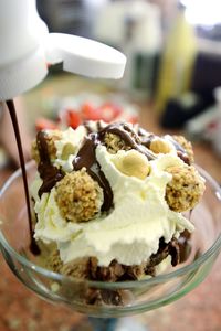 Close-up of ice cream served on table