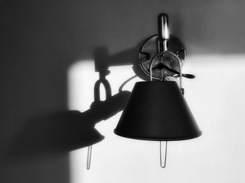 Close-up of electric lamp hanging
