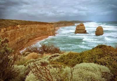 Scenic view of sea against cloudy sky