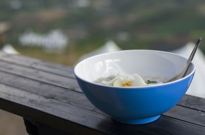 Close-up of ice cream in bowl on table