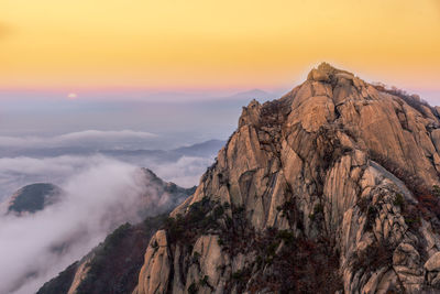 Scenic view of mountain against sky during sunset