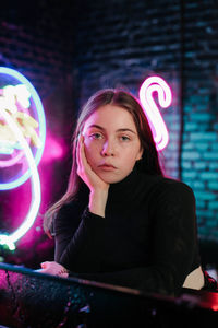 Portrait of young woman looking away