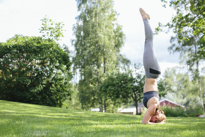 Woman doing headstand