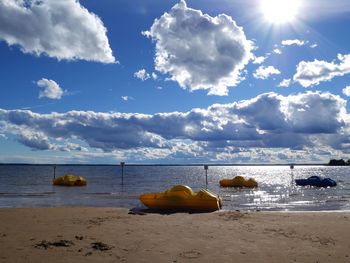 Scenic view of sea against cloudy sky