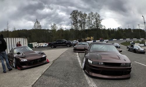 Cars on road against sky