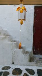 Low angle view of lanterns hanging on building