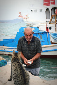 Fisher with cat