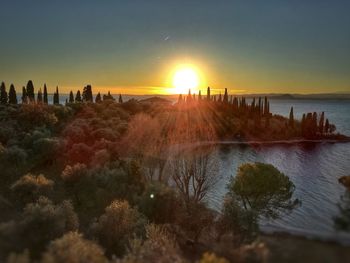 Panoramic view of sea against sky during sunset