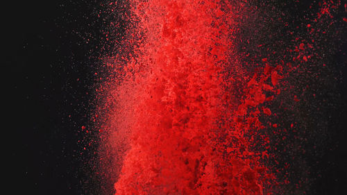 Full frame shot of powder paints against black background