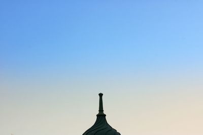 High section of built structure against clear sky