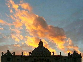 Low angle view of cathedral against cloudy sky