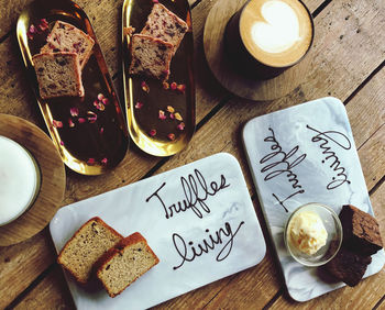 High angle view of dessert with coffee on table