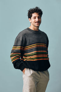 Portrait of man standing against clear sky