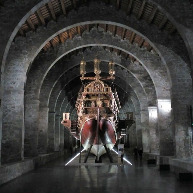 indoors, architecture, arch, built structure, ceiling, old, illuminated, history, religion, place of worship, interior, hanging, lighting equipment, tunnel, spirituality, brick wall, chandelier, corridor, the way forward, building