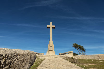 Cross against sky