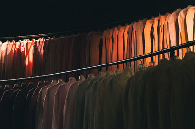 Close-up of clothes hanging at store