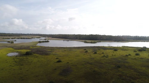 Scenic view of lake against sky
