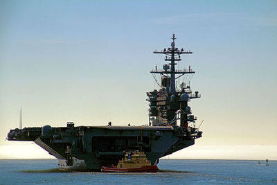 Ship in sea against clear sky