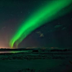 Scenic view of sea against sky at night