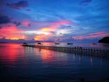 Scenic view of sea against sky at sunset