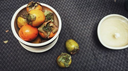 High angle view of fruits in bowl on table