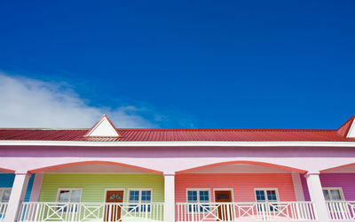 Low angle view of building against blue sky