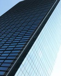 Low angle view of modern building against clear sky