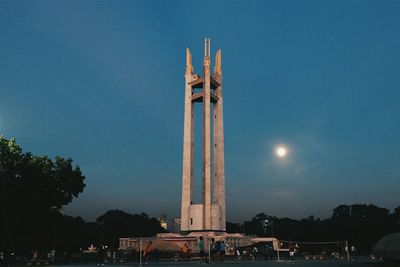 Low angle view of building against clear blue sky