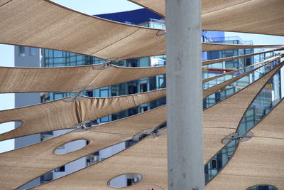 Close-up of built structure against blue sky