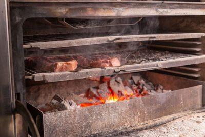 Close-up of meat on barbecue grill