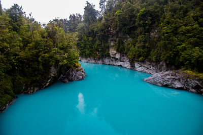 The beautiful blue glacial river in hokitika gorge