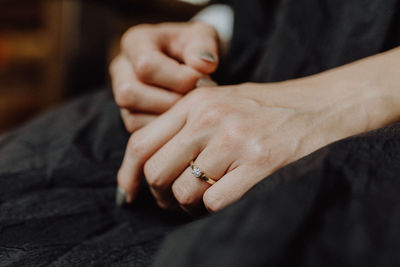 Close-up of man holding hands