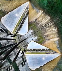 High angle view of buildings seen through glass window