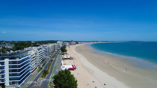 High angle view of beach against blue sky