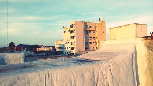 Panoramic view of city against sky during winter