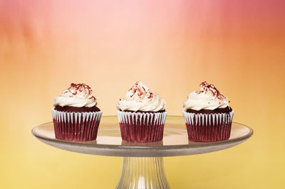 Close-up of cupcakes against white background
