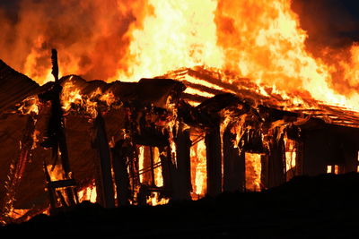 Panoramic view of bonfire at night